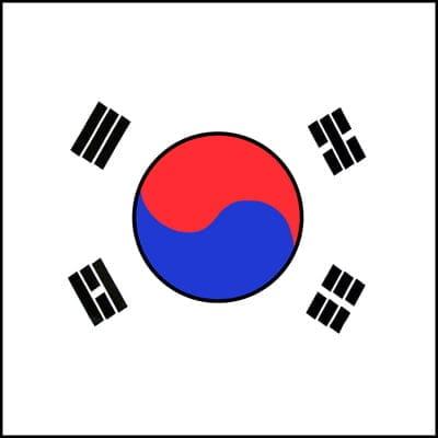 A circular symbol with red and blue sections is in the center surrounded by four black symbols on a white background representing the flag of South Korea