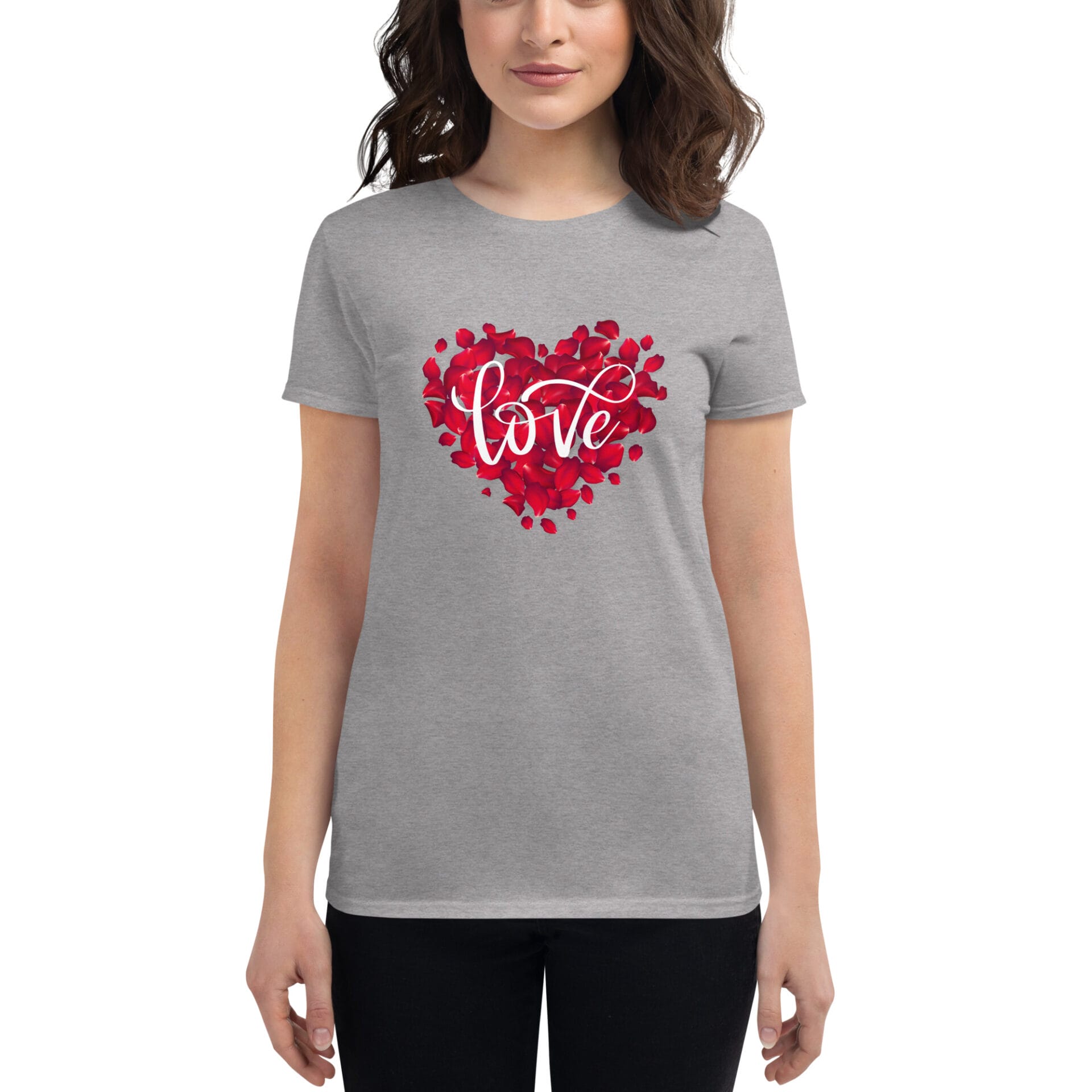 A gray t-shirt features a heart shape made of red rose petals with the word love elegantly scripted in the center. A young woman stands wearing the shirt smiling.