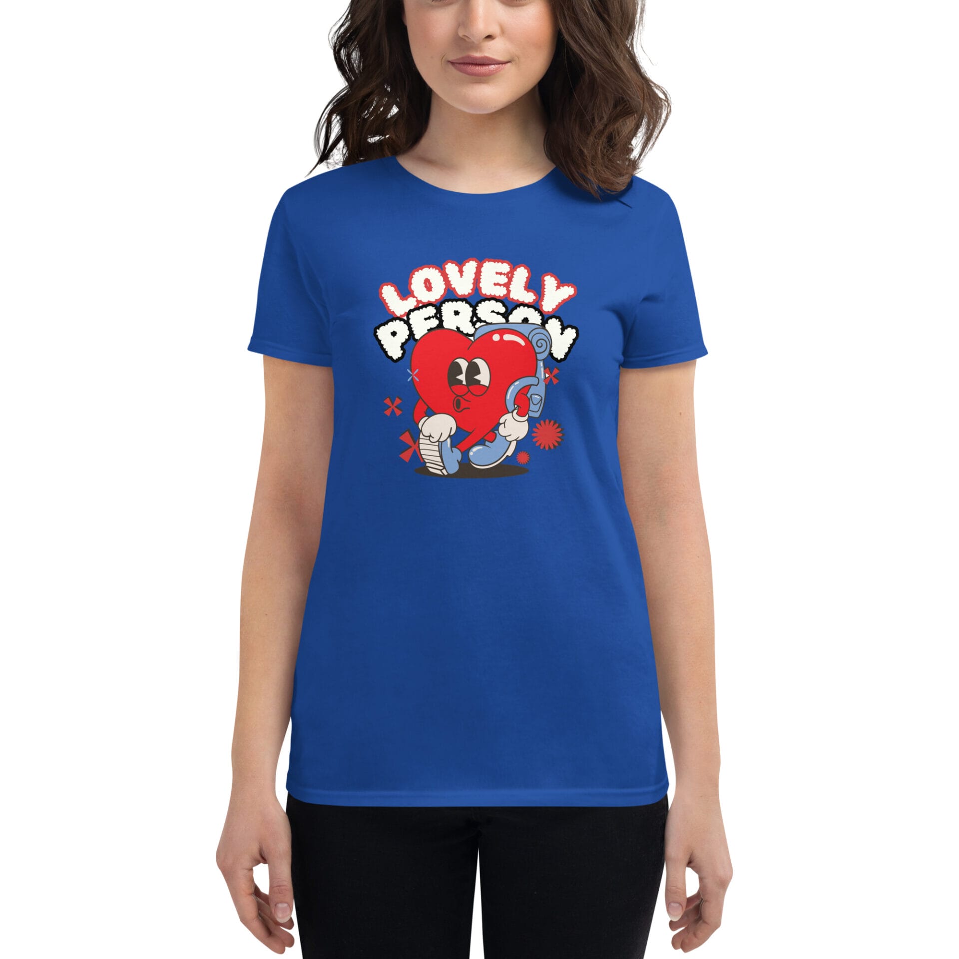 A woman wears a blue t-shirt featuring a red heart character wearing headphones and boxing gloves with the text "LOVELY PERSON" above it against a simple background.